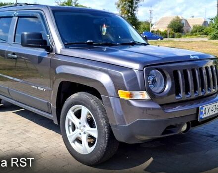 Серый Джип Патриот, объемом двигателя 2.4 л и пробегом 154 тыс. км за 11000 $, фото 1 на Automoto.ua