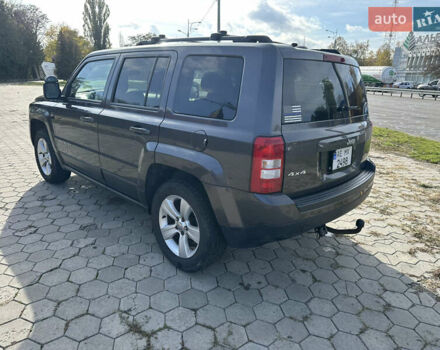 Серый Джип Патриот, объемом двигателя 2.36 л и пробегом 230 тыс. км за 9000 $, фото 3 на Automoto.ua