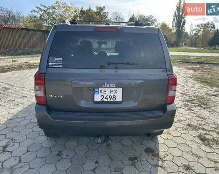 Серый Джип Патриот, объемом двигателя 2.36 л и пробегом 230 тыс. км за 9000 $, фото 4 на Automoto.ua