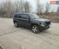 Серый Джип Патриот, объемом двигателя 2.36 л и пробегом 98 тыс. км за 12000 $, фото 1 на Automoto.ua
