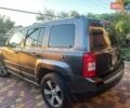 Серый Джип Патриот, объемом двигателя 2.36 л и пробегом 83 тыс. км за 11800 $, фото 5 на Automoto.ua