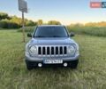 Серый Джип Патриот, объемом двигателя 2.4 л и пробегом 179 тыс. км за 9900 $, фото 1 на Automoto.ua