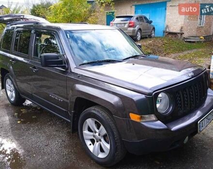Серый Джип Патриот, объемом двигателя 2.36 л и пробегом 125 тыс. км за 11800 $, фото 1 на Automoto.ua