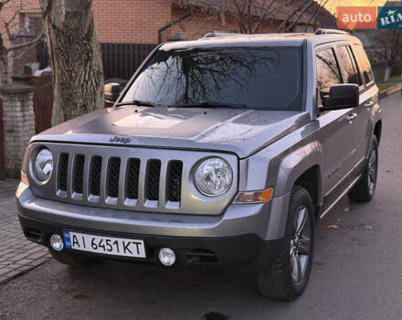 Серый Джип Патриот, объемом двигателя 2.4 л и пробегом 143 тыс. км за 12600 $, фото 1 на Automoto.ua