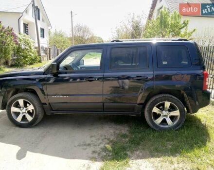 Синий Джип Патриот, объемом двигателя 2.4 л и пробегом 97 тыс. км за 12000 $, фото 1 на Automoto.ua