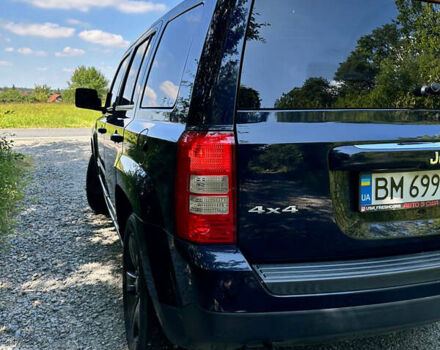 Синий Джип Патриот, объемом двигателя 2.36 л и пробегом 153 тыс. км за 12000 $, фото 2 на Automoto.ua