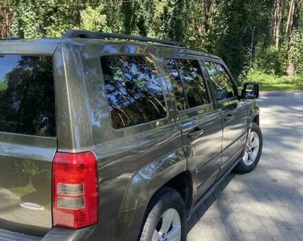 Зеленый Джип Патриот, объемом двигателя 2.36 л и пробегом 243 тыс. км за 9500 $, фото 4 на Automoto.ua