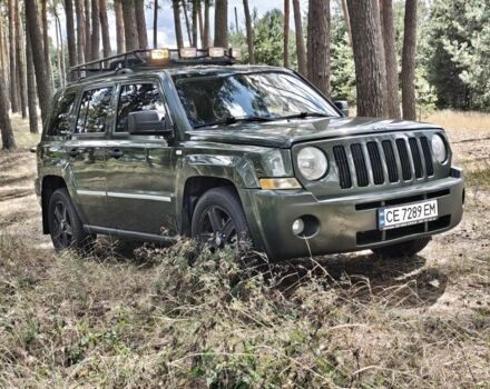 Зеленый Джип Патриот, объемом двигателя 2.4 л и пробегом 219 тыс. км за 6000 $, фото 1 на Automoto.ua