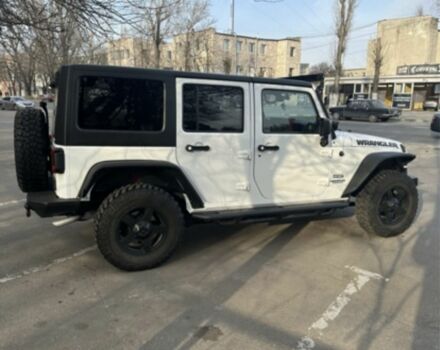 Білий Джип Wrangler, об'ємом двигуна 0.36 л та пробігом 77 тис. км за 36500 $, фото 3 на Automoto.ua