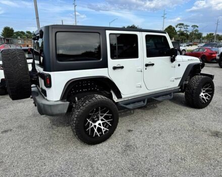 Білий Джип Wrangler, об'ємом двигуна 3.6 л та пробігом 65 тис. км за 5650 $, фото 3 на Automoto.ua