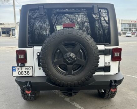 Білий Джип Wrangler, об'ємом двигуна 0.36 л та пробігом 77 тис. км за 36500 $, фото 4 на Automoto.ua