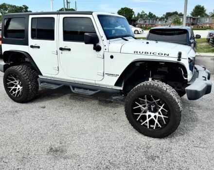 Білий Джип Wrangler, об'ємом двигуна 3.6 л та пробігом 65 тис. км за 5650 $, фото 1 на Automoto.ua