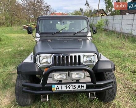 Чорний Джип Wrangler, об'ємом двигуна 4 л та пробігом 120 тис. км за 10000 $, фото 1 на Automoto.ua
