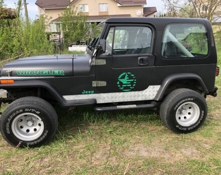Чорний Джип Wrangler, об'ємом двигуна 4 л та пробігом 120 тис. км за 10000 $, фото 1 на Automoto.ua