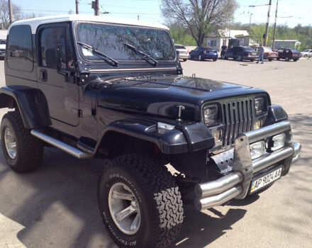 Чорний Джип Wrangler, об'ємом двигуна 2.5 л та пробігом 50 тис. км за 10000 $, фото 8 на Automoto.ua