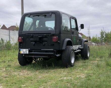 Чорний Джип Wrangler, об'ємом двигуна 4 л та пробігом 1 тис. км за 10000 $, фото 7 на Automoto.ua