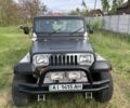 Чорний Джип Wrangler, об'ємом двигуна 4 л та пробігом 120 тис. км за 10000 $, фото 2 на Automoto.ua