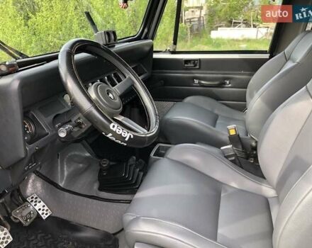 Чорний Джип Wrangler, об'ємом двигуна 4 л та пробігом 120 тис. км за 10000 $, фото 2 на Automoto.ua