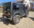 Чорний Джип Wrangler, об'ємом двигуна 3.96 л та пробігом 227 тис. км за 15000 $, фото 5 на Automoto.ua