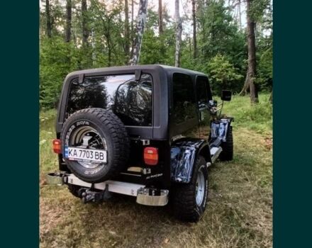 Чорний Джип Wrangler, об'ємом двигуна 0 л та пробігом 100 тис. км за 10500 $, фото 1 на Automoto.ua