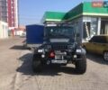 Чорний Джип Wrangler, об'ємом двигуна 2.46 л та пробігом 100 тис. км за 24000 $, фото 1 на Automoto.ua