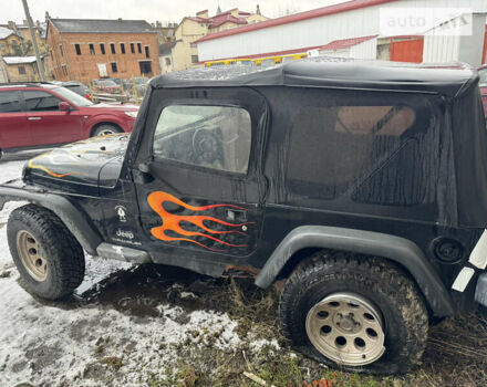 Чорний Джип Wrangler, об'ємом двигуна 2.4 л та пробігом 169 тис. км за 8200 $, фото 3 на Automoto.ua