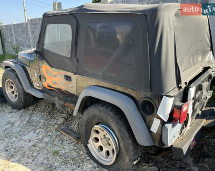 Черный Джип Вранглер, объемом двигателя 2.4 л и пробегом 20 тыс. км за 5200 $, фото 3 на Automoto.ua