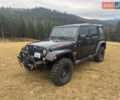 Черный Джип Вранглер, объемом двигателя 3.6 л и пробегом 170 тыс. км за 23500 $, фото 1 на Automoto.ua