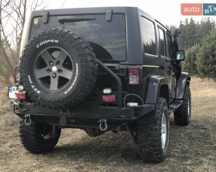 Черный Джип Вранглер, объемом двигателя 2.77 л и пробегом 175 тыс. км за 26900 $, фото 5 на Automoto.ua