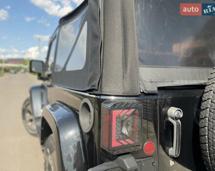 Черный Джип Вранглер, объемом двигателя 3.6 л и пробегом 168 тыс. км за 18900 $, фото 11 на Automoto.ua