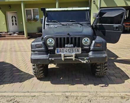 Чорний Джип Wrangler, об'ємом двигуна 3.96 л та пробігом 227 тис. км за 15000 $, фото 1 на Automoto.ua