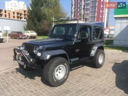 Джип Wrangler 2000 у Луцьку на Automoto.ua Чорний Джип Wrangler, об'ємом двигуна 2.46 л та пробігом 100 тис. км за 24000 $, фото 1 на Automoto.ua