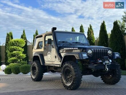 Джип Wrangler 2000 у Мукачеве на Automoto.ua Чорний Джип Wrangler, об'ємом двигуна 2.46 л та пробігом 200 тис. км за 14700 $, фото 1 на Automoto.ua