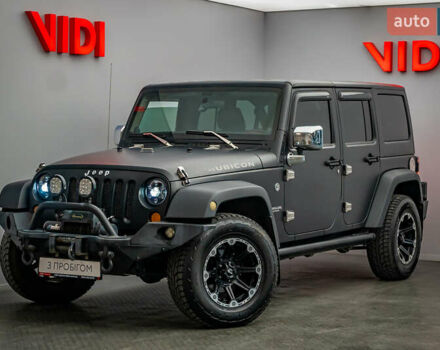 Черный Джип Вранглер, объемом двигателя 3.8 л и пробегом 173 тыс. км за 21869 $, фото 1 на Automoto.ua