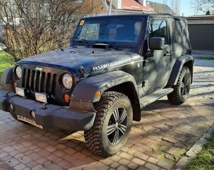 Черный Джип Вранглер, объемом двигателя 3.8 л и пробегом 70 тыс. км за 27500 $, фото 1 на Automoto.ua