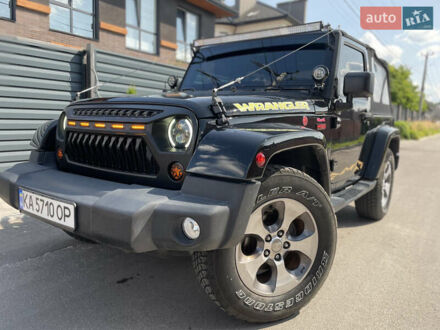 Черный Джип Вранглер, объемом двигателя 3.6 л и пробегом 168 тыс. км за 18900 $, фото 1 на Automoto.ua