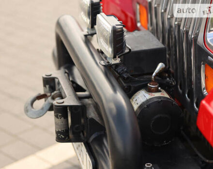 Червоний Джип Wrangler, об'ємом двигуна 4.2 л та пробігом 160 тис. км за 15500 $, фото 1 на Automoto.ua