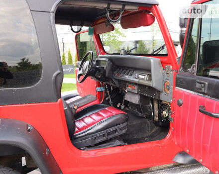 Червоний Джип Wrangler, об'ємом двигуна 4.2 л та пробігом 160 тис. км за 15500 $, фото 30 на Automoto.ua