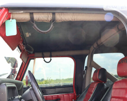 Красный Джип Вранглер, объемом двигателя 4.2 л и пробегом 160 тыс. км за 15500 $, фото 24 на Automoto.ua