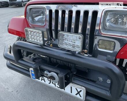 Червоний Джип Wrangler, об'ємом двигуна 4.2 л та пробігом 135 тис. км за 10950 $, фото 11 на Automoto.ua