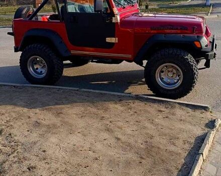 Красный Джип Вранглер, объемом двигателя 4 л и пробегом 200 тыс. км за 14500 $, фото 2 на Automoto.ua