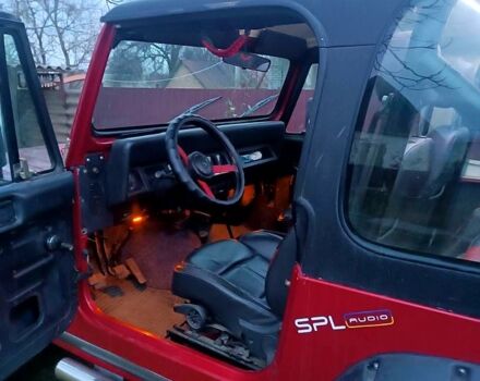 Красный Джип Вранглер, объемом двигателя 4 л и пробегом 200 тыс. км за 14500 $, фото 5 на Automoto.ua