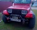 Красный Джип Вранглер, объемом двигателя 4 л и пробегом 200 тыс. км за 14500 $, фото 1 на Automoto.ua