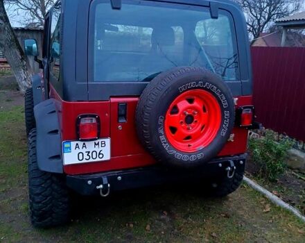 Красный Джип Вранглер, объемом двигателя 4 л и пробегом 200 тыс. км за 14500 $, фото 8 на Automoto.ua