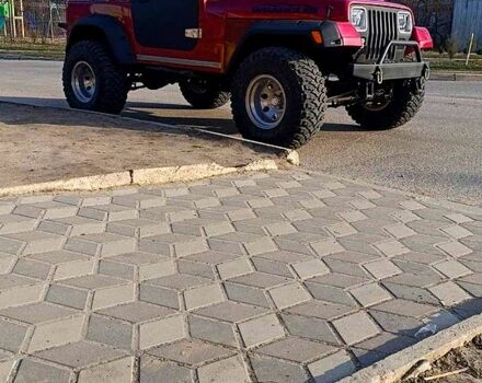 Красный Джип Вранглер, объемом двигателя 4 л и пробегом 200 тыс. км за 14500 $, фото 3 на Automoto.ua