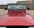Червоний Джип Wrangler, об'ємом двигуна 3.96 л та пробігом 200 тис. км за 14500 $, фото 1 на Automoto.ua