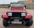 Червоний Джип Wrangler, об'ємом двигуна 3.96 л та пробігом 200 тис. км за 14500 $, фото 1 на Automoto.ua