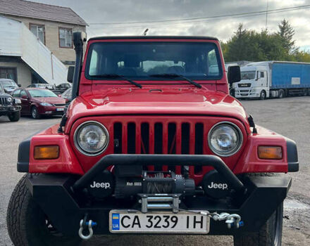 Червоний Джип Wrangler, об'ємом двигуна 2.5 л та пробігом 177 тис. км за 15500 $, фото 2 на Automoto.ua