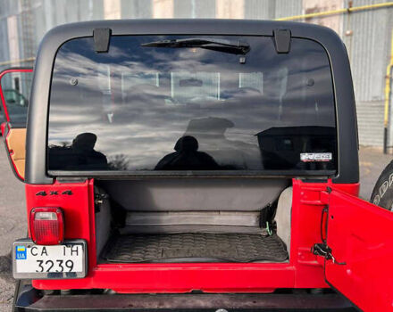 Красный Джип Вранглер, объемом двигателя 2.5 л и пробегом 177 тыс. км за 14999 $, фото 7 на Automoto.ua