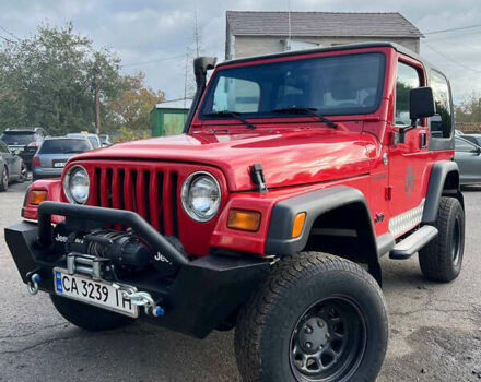 Червоний Джип Wrangler, об'ємом двигуна 2.5 л та пробігом 177 тис. км за 15500 $, фото 1 на Automoto.ua